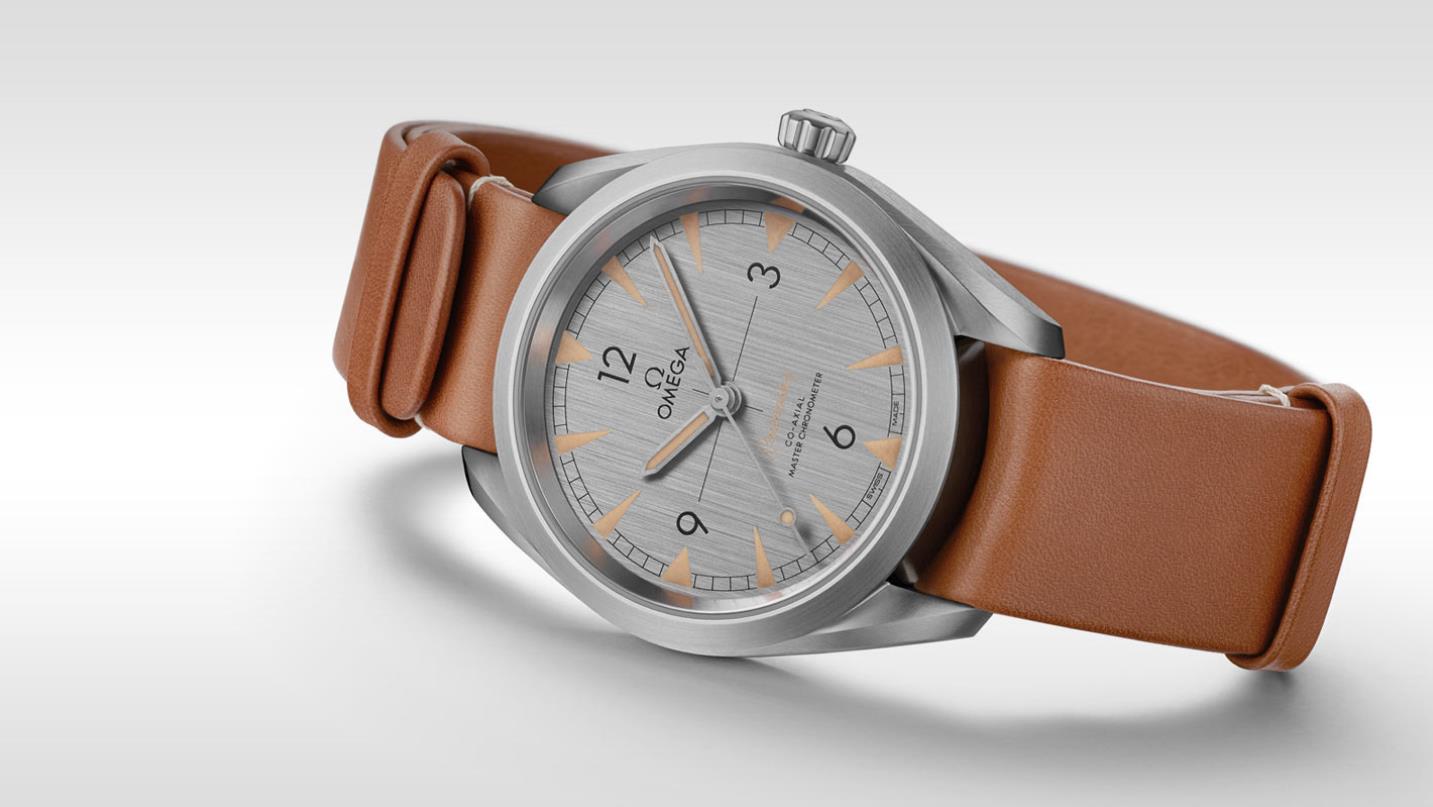 The stainless steel fake watches have brown straps.