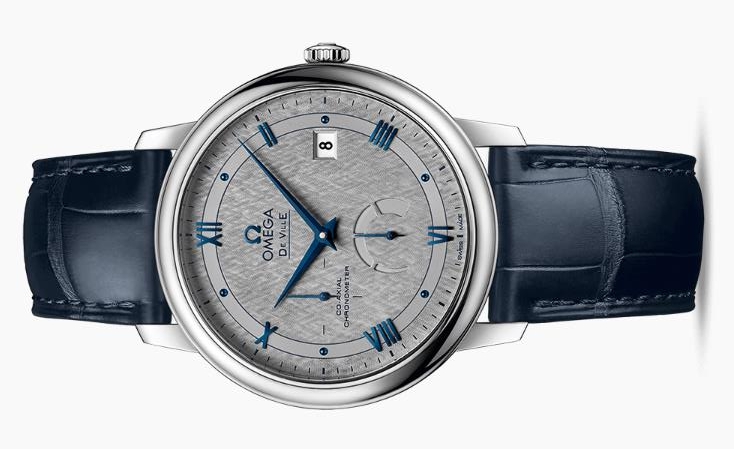 The grey dials copy watches have blue leather straps.